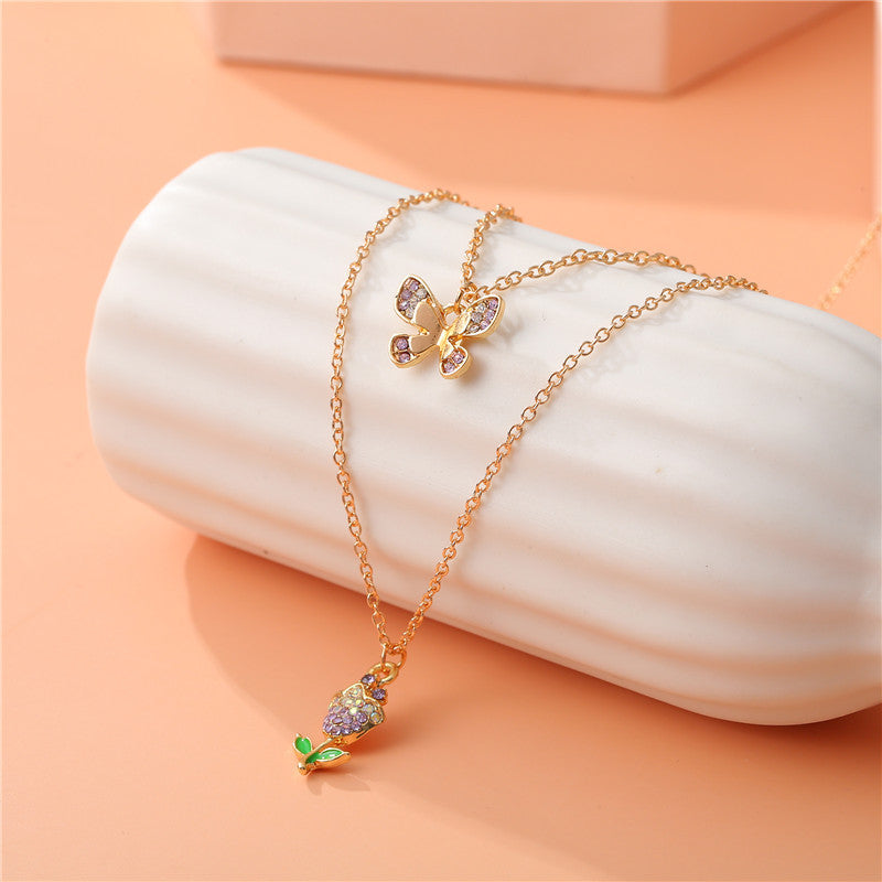 Elegante Collana con Ciondolo a Farfalla e Rosa Floreale per Bambini, Collana Multistrato in Lega con Intarsio di Strass e Catena a Croce