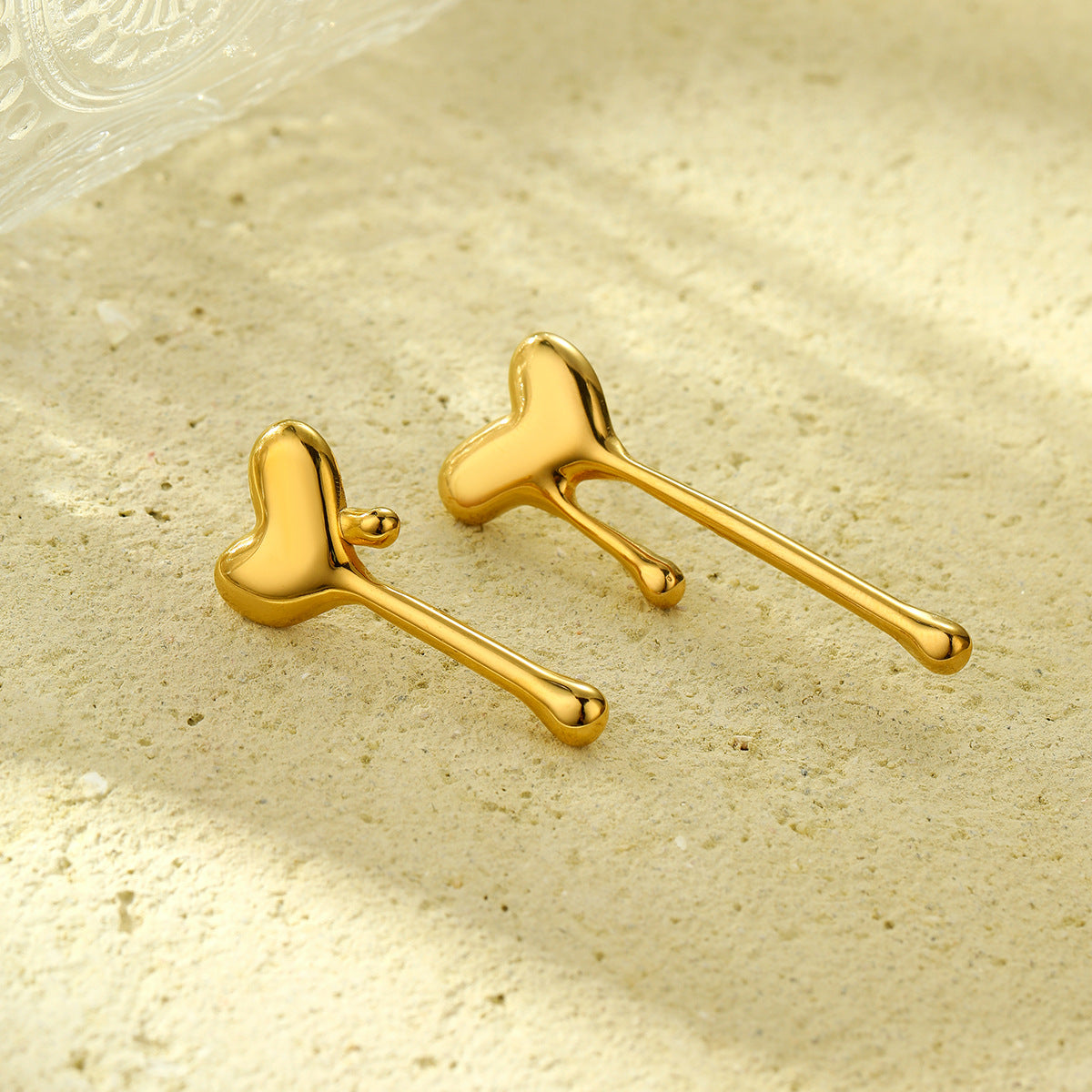Fashionable Minimalist Lava Heart-Shaped Titanium Steel Earrings for Women with Dangling Teardrop and Tassel Details