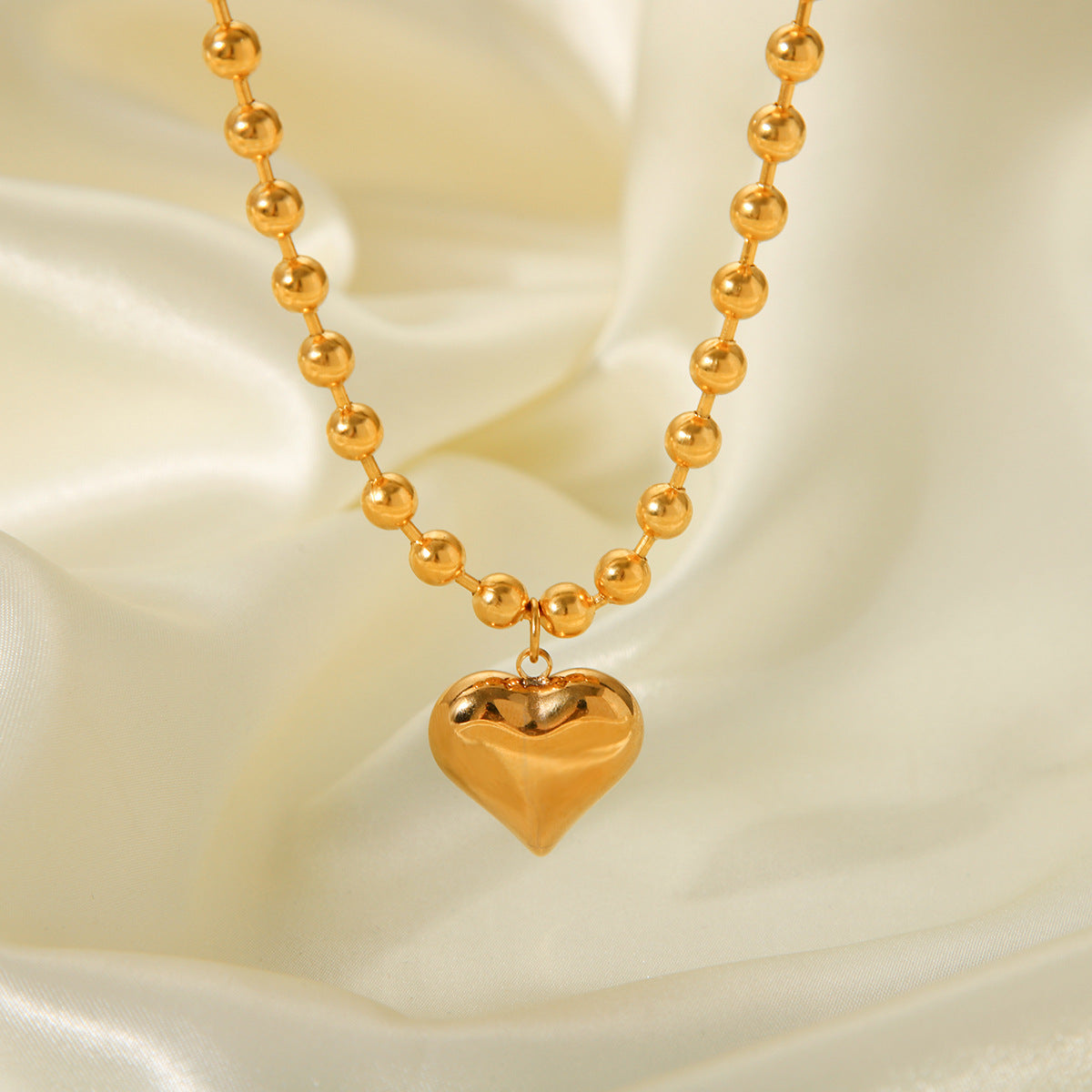 Collana da Donna con Ciondolo a Cuore Geometrico Placcato Oro 18K e Catena di Perline in Acciaio Inossidabile